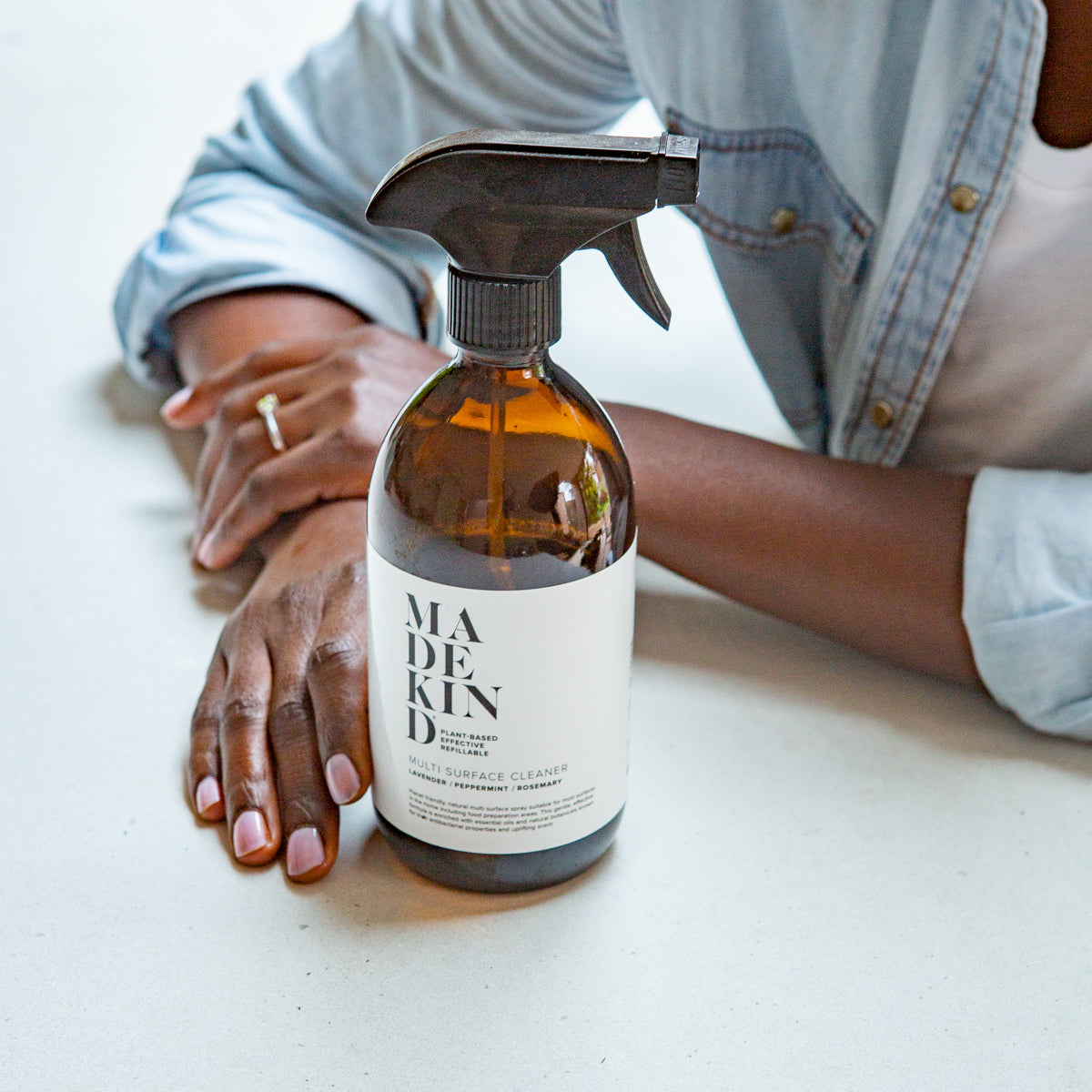 MadeKind non toxic multi surface spray on kitchen table