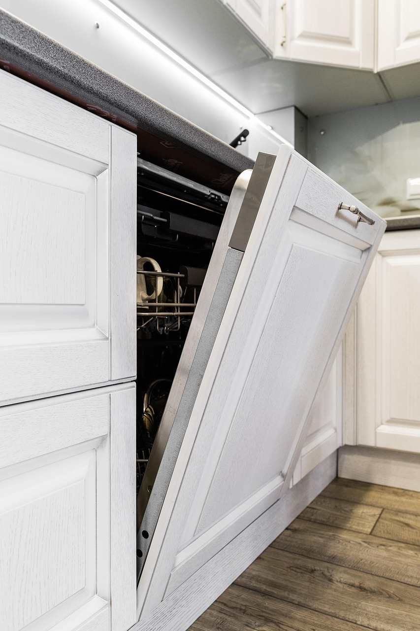Integrated dishwasher with a custom cabinet panel