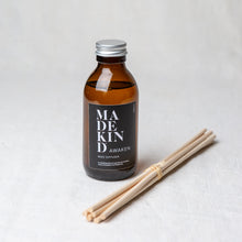 Load image into Gallery viewer, Photo of 140ml full amber glass awaken reed diffuser bottle
