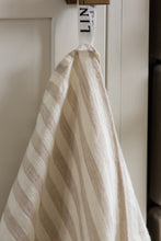 Load image into Gallery viewer, Photo of a hanging white and beige striped woven linen tea towel

