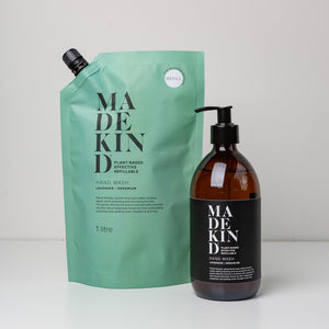 photo of a MadeKind Hand Wash 1 litre refill pouch and a 300ml amber glass bottle of hand wash