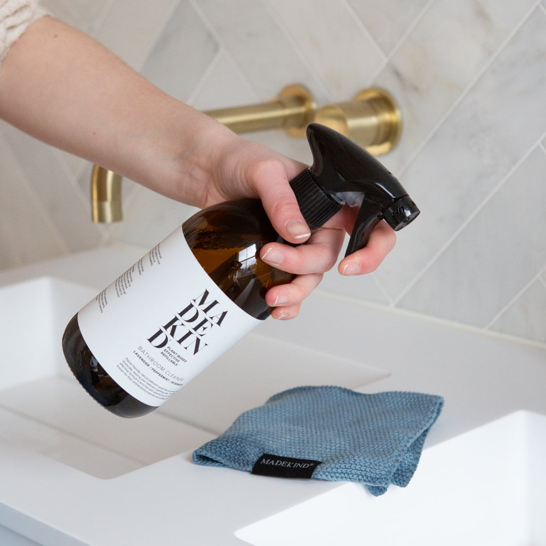 MadeKind Bathroom Cleaner in an amber glass bottle