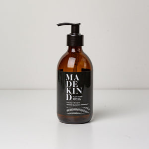 Photo of empty 300ml amber glass bottle for MadeKind hand wash