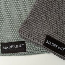 Load image into Gallery viewer, Photo of two grey madekind organic cotton  dishcloths 
