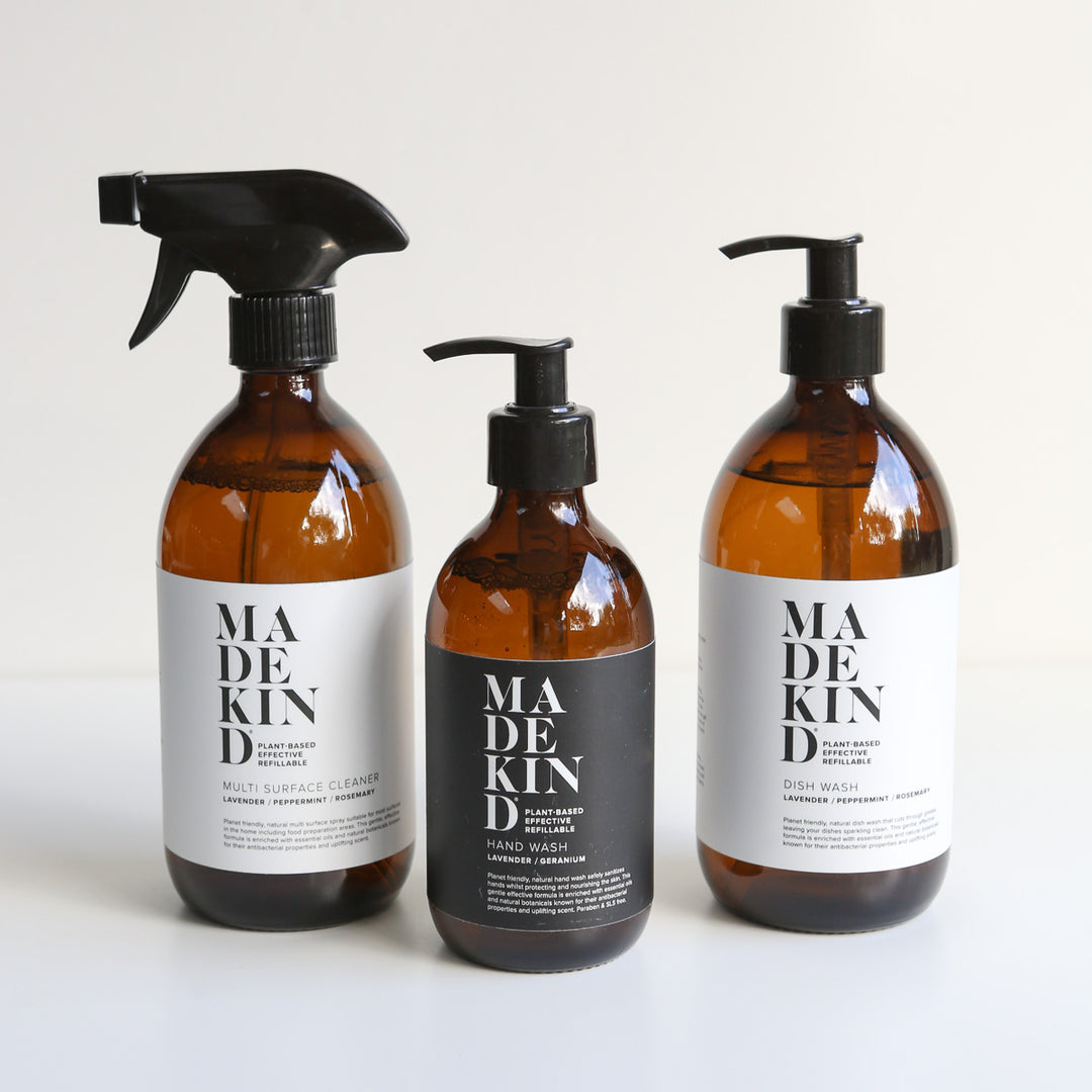 Photo of MadeKind multi surface cleaner, dish wash and luxury hand wash in amber glass bottles
