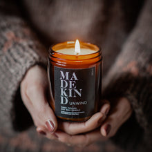 Load image into Gallery viewer, Madekind Unwind Soy wax aromatherapy candle with essential oils in glass container
