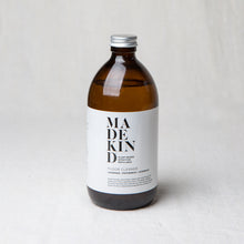 Load image into Gallery viewer, Photo of MadeKind Natural, eco friendly floor cleaner in 500ml amber glass bottle
