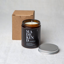Load image into Gallery viewer, Madekind Unwind Soy wax aromatherapy candle with essential oils in glass container
